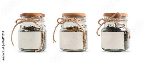 Tea in glass jars isolated on white background. Mockup label.