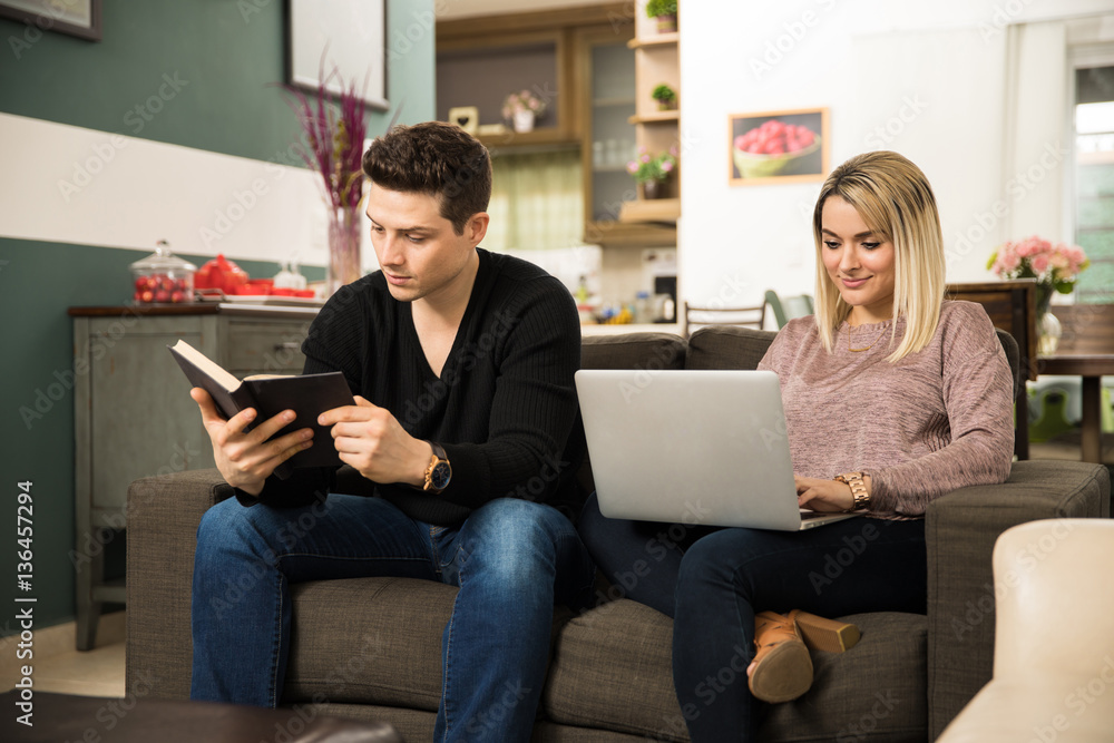Young couple relaxing together at home Young couple relaxing together at home