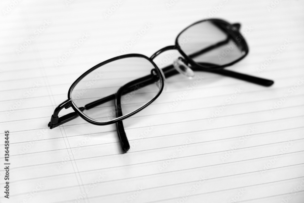 Glasses on Notebook for Business or Studying Glasses on Notebook for Business or Studying