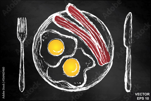 Scrambled eggs with bacon on a chalkboard. Breakfast. For your design.