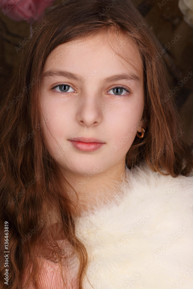 Close up portrait of beautiful teen girl with long hair 