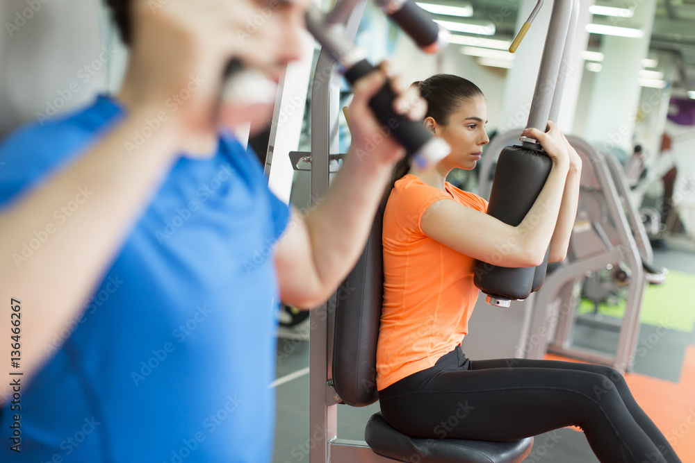 Fototapeta premium Woman training in the gym