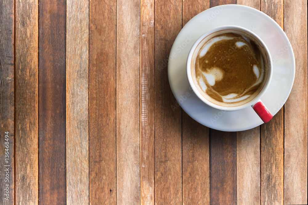 Hot cappuchino copy space on top view wood background Hot cappuchino copy space on top view wood background