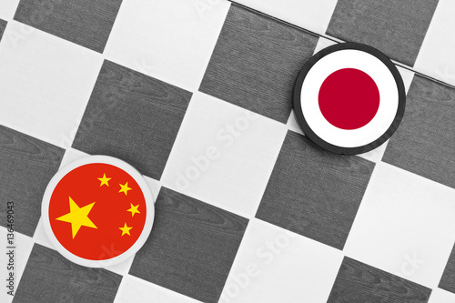 Draughts (Checkers) - China vs Japan - problem, tension, conflict, clash and war between Chinese and Japanese country photo