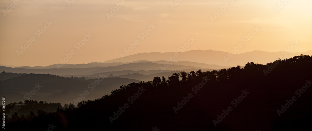 Sunrise over the tuscany hills