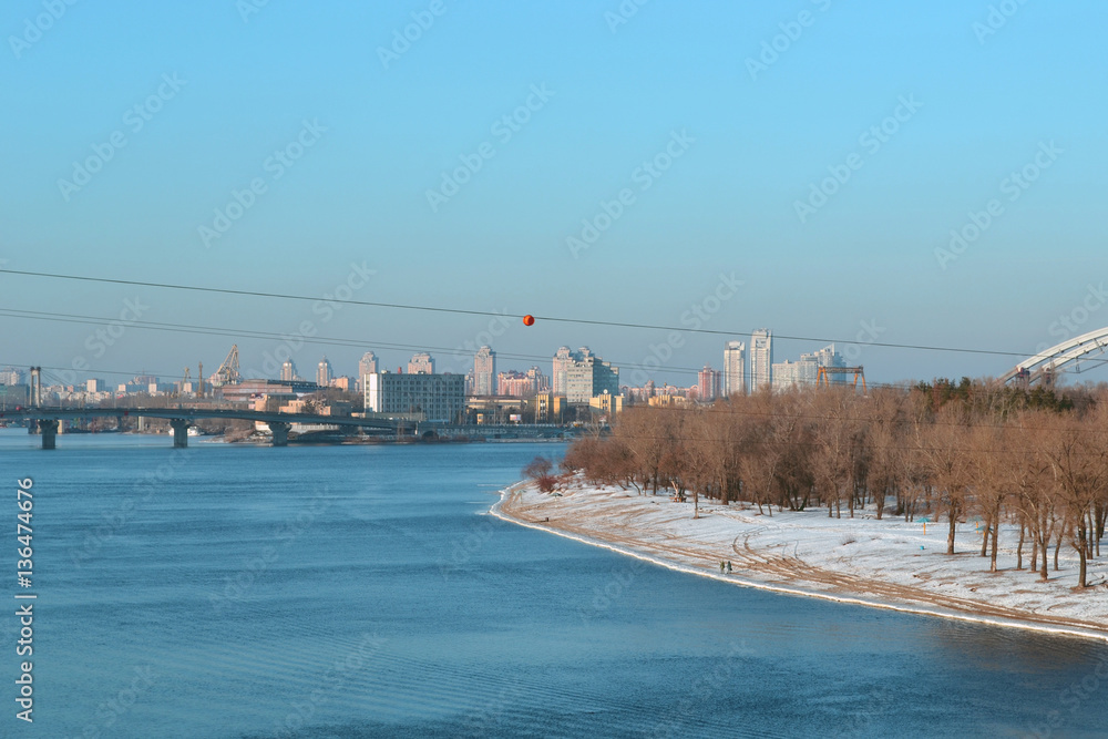 Bridge point view at the Kyiv city over the river Dnipro bank