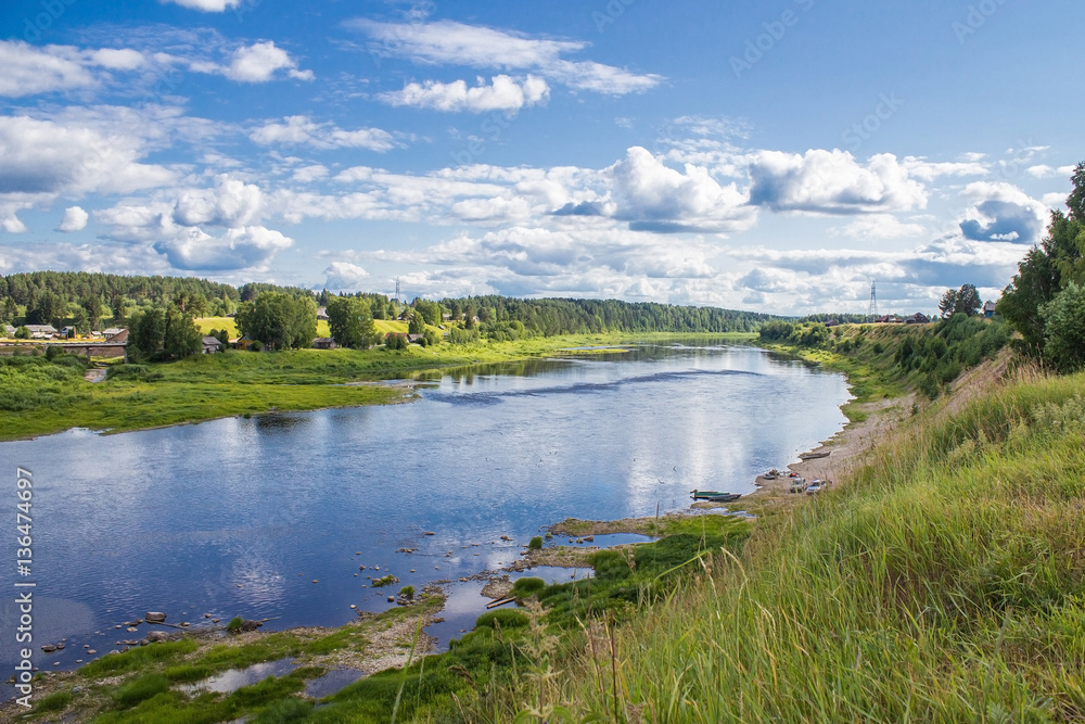 Sukhona river and Totma city on its opposite bank, Vologodskaya region, Russia