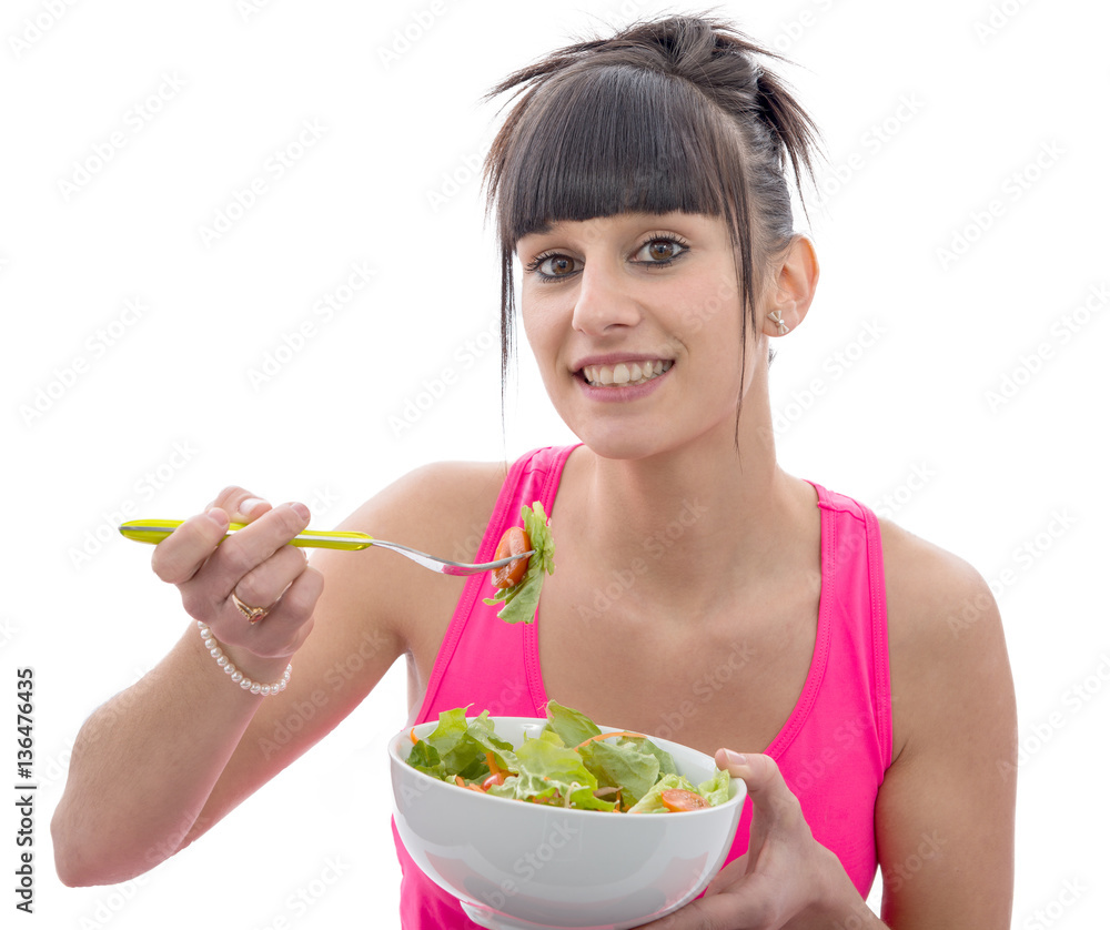 young brunette sporty woman eats salad young brunette sporty woman eats salad