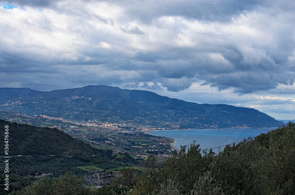 Beautiful mountain landscape. Cloudy day. View from sightseeing area near Sanctuary of the Madonna di Tindari. Tindari. Sicily 