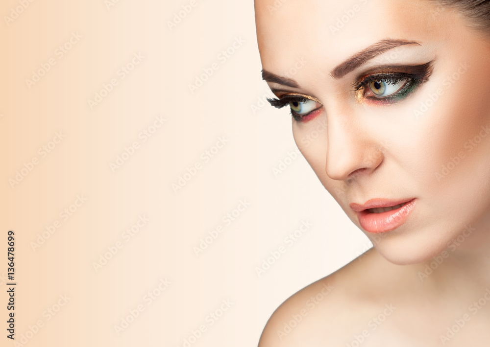 Fototapeta premium Young woman with makeup closeup