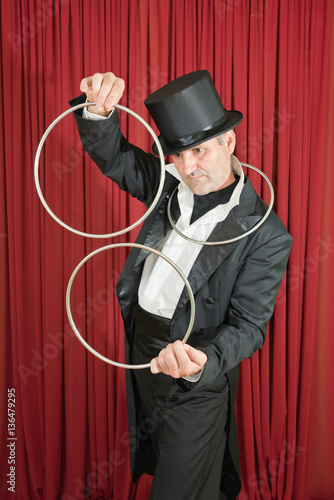 Magician separating iron rings