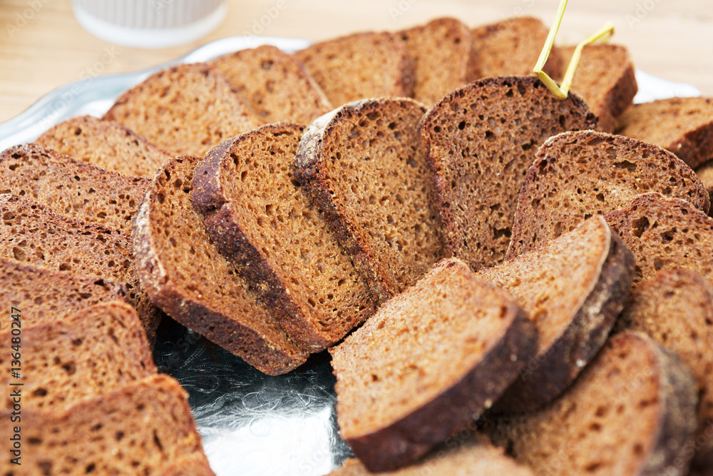 Bakery concept. Plenty of sliced bread background Bakery concept. Plenty of sliced bread background