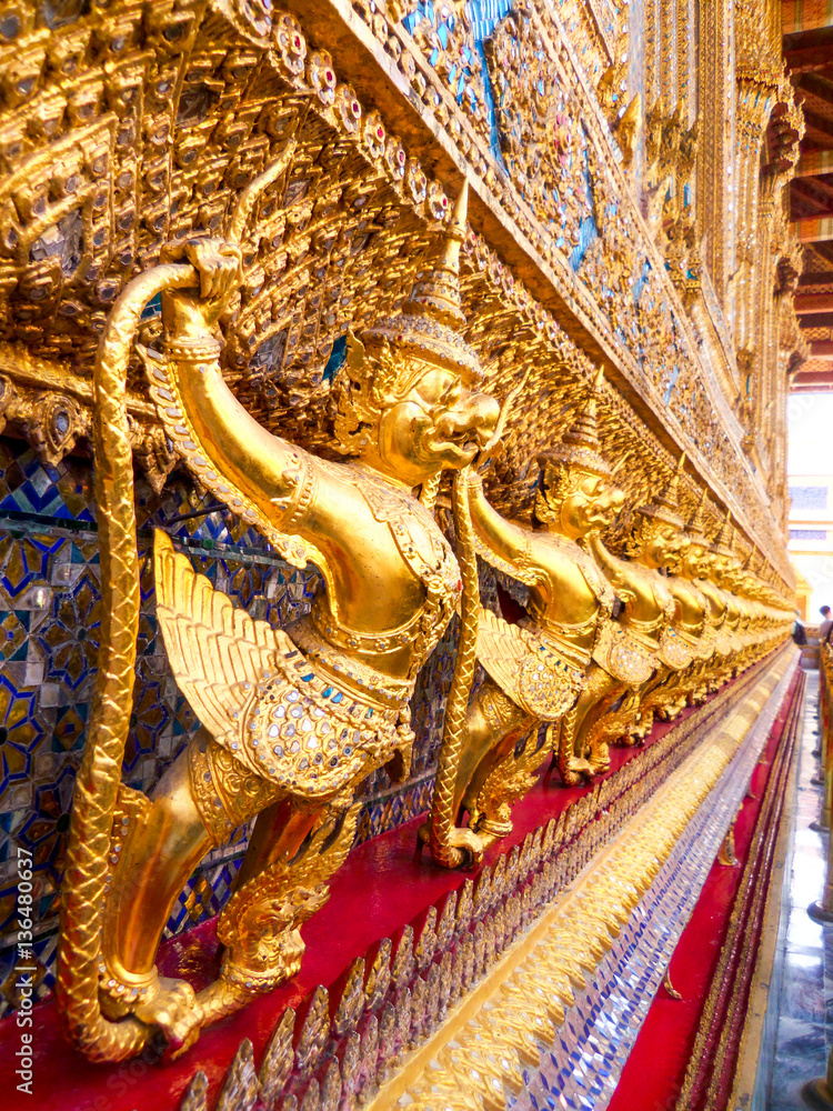 Golden Garuda catching Naga sculpture at Wat Phra Kraw, Bangkok