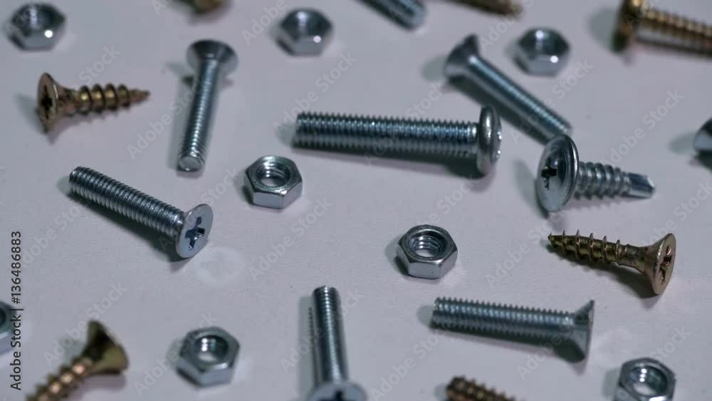 screws, bolts, nuts, lying in the spread screws, bolts, nuts, lying in the spread