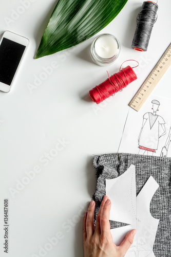 desktop designer clothes with tools top view mock up