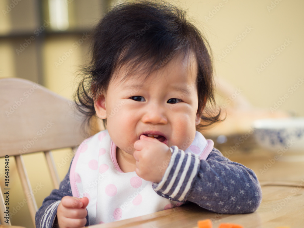 baby girl eating vegetable first time at home baby girl eating vegetable first time at home