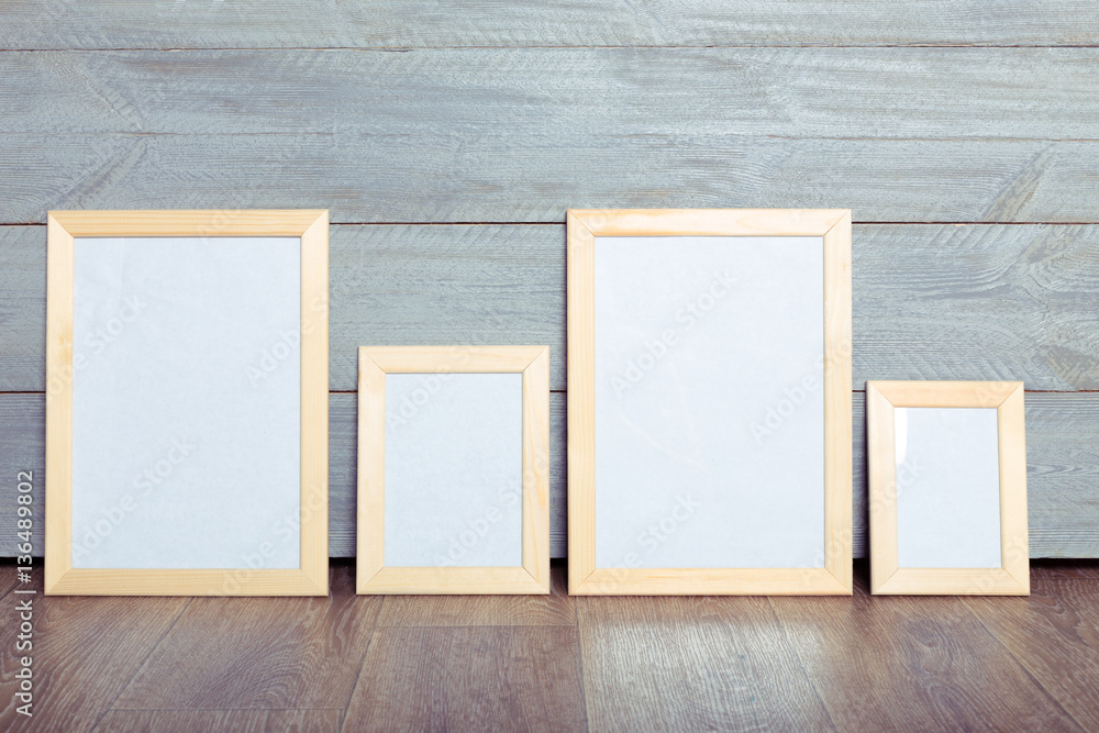 photo frames on the wooden wall photo frames on the wooden wall
