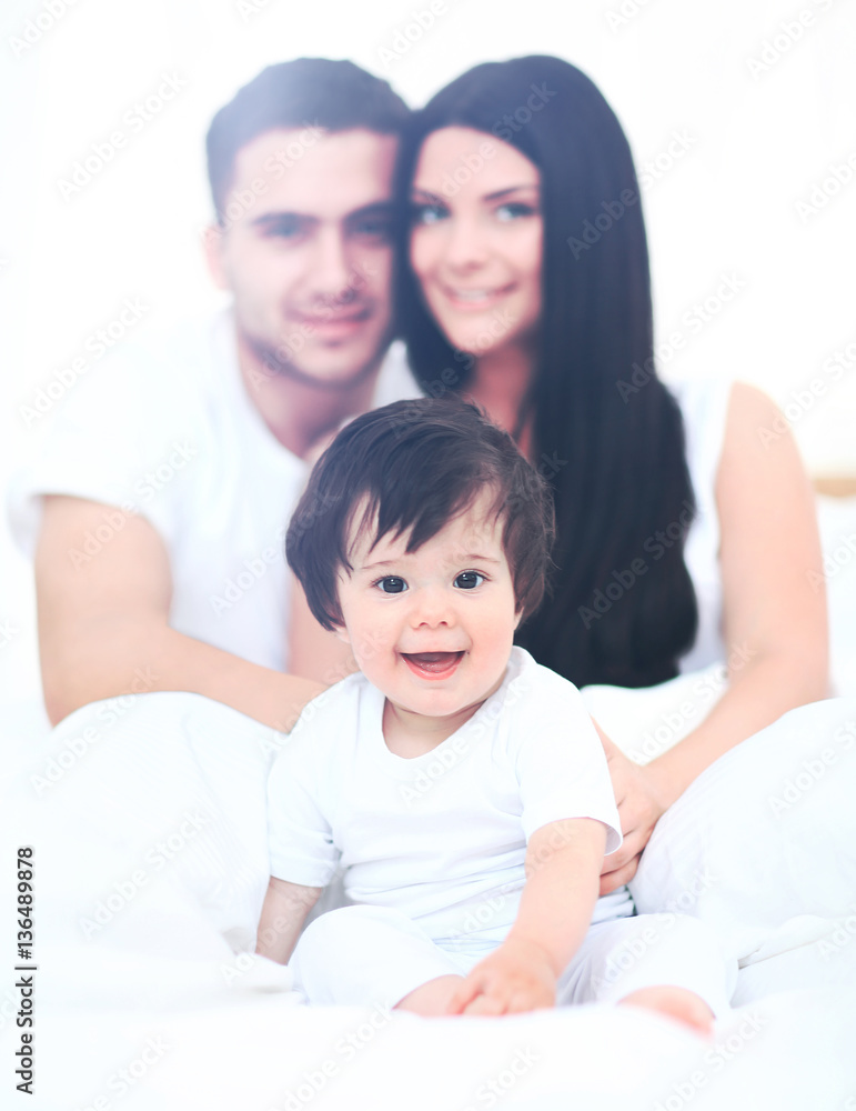 family with young children to bed in the bedroom