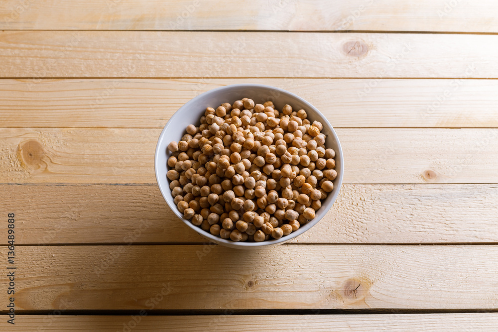 Soybeans over wooden table background Soybeans over wooden table background
