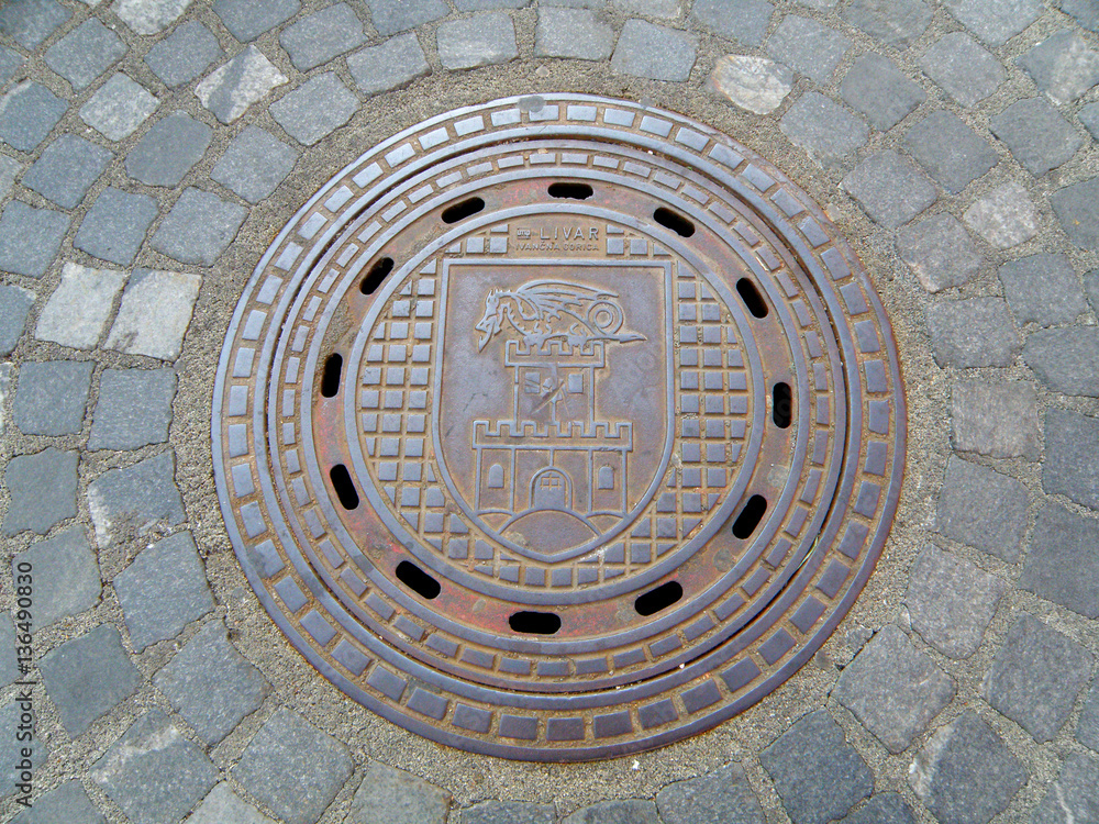 Manhole Cover found on the cobblestone path in Ljubljana of Slovenia  