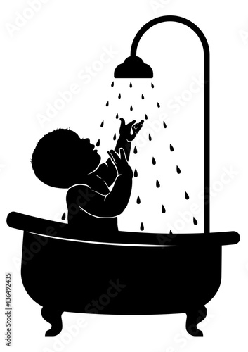 Silhouette baby in bath under shower