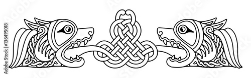 Celtic zoomorphic national figure. Two Dogs head with open mouth and bared fangs looking at each other.
