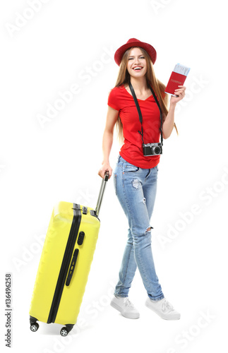Woman traveler with passpor...