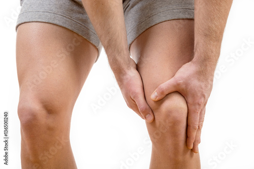 Man with knee pain over white background