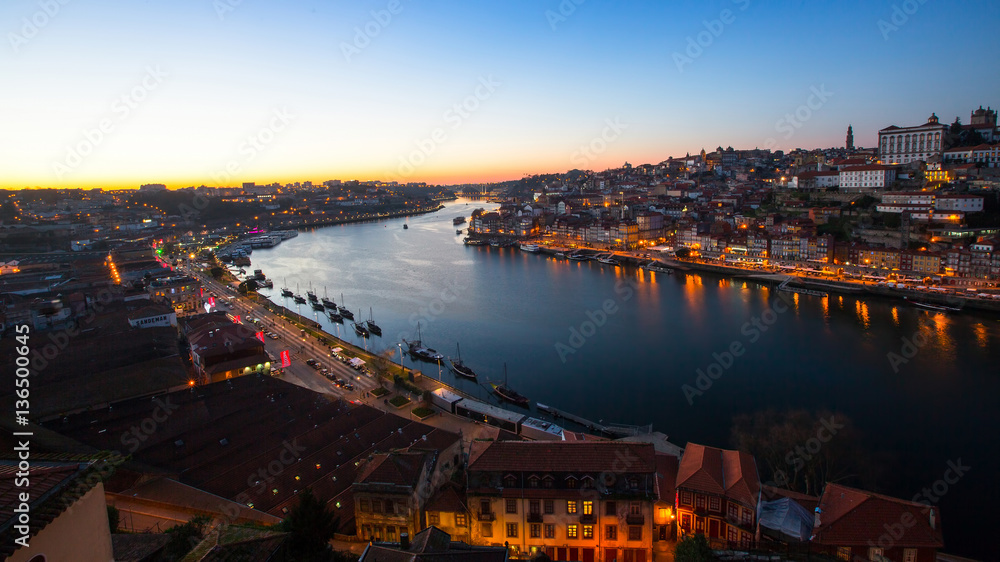 View over the Douro river by night, Porto, Portugal.