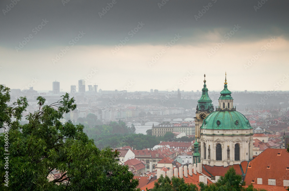 Prague Church of St. Nicholas, a downpour over the city