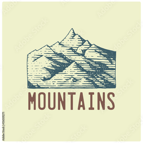 engraved vintage logo with mountains in hand drawn, sketch style, old looking retro badge for national parks and camping, alpine and hiking theme