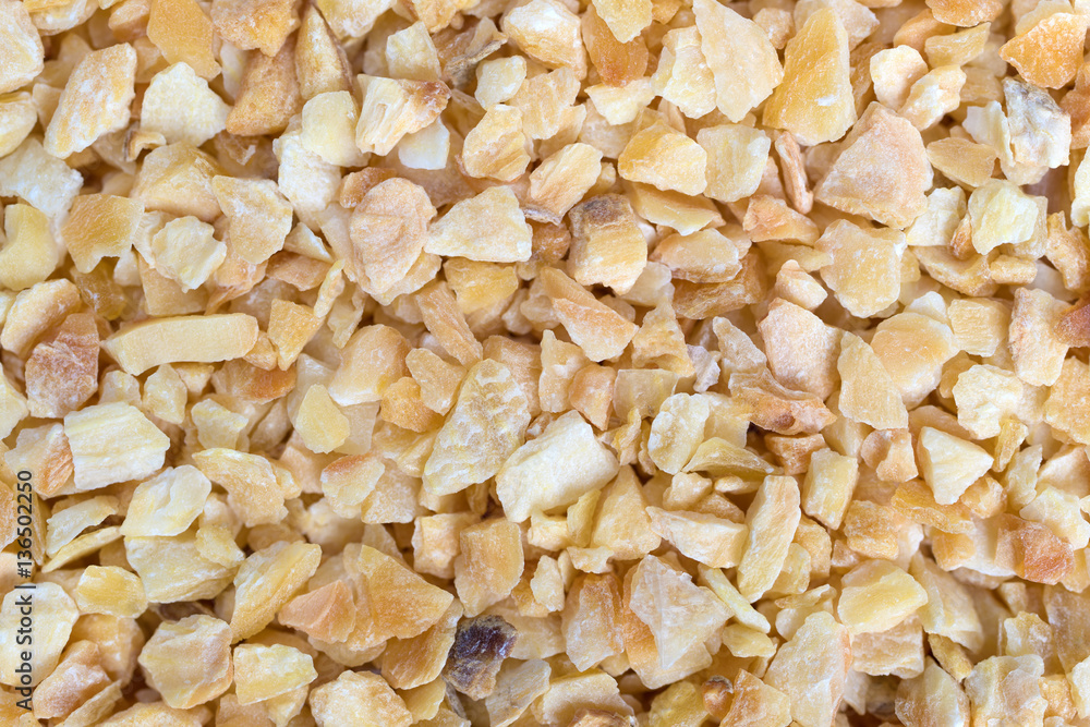 A very close view of dried minced garlic. A very close view of dried minced garlic.