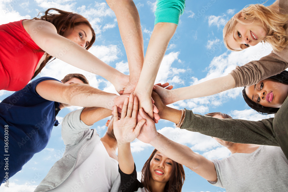 Students Stacking Hands