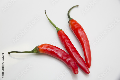 red chili peppers on white background