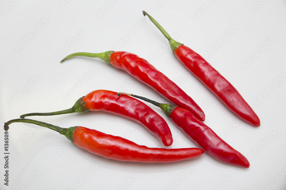 red chili peppers on white background