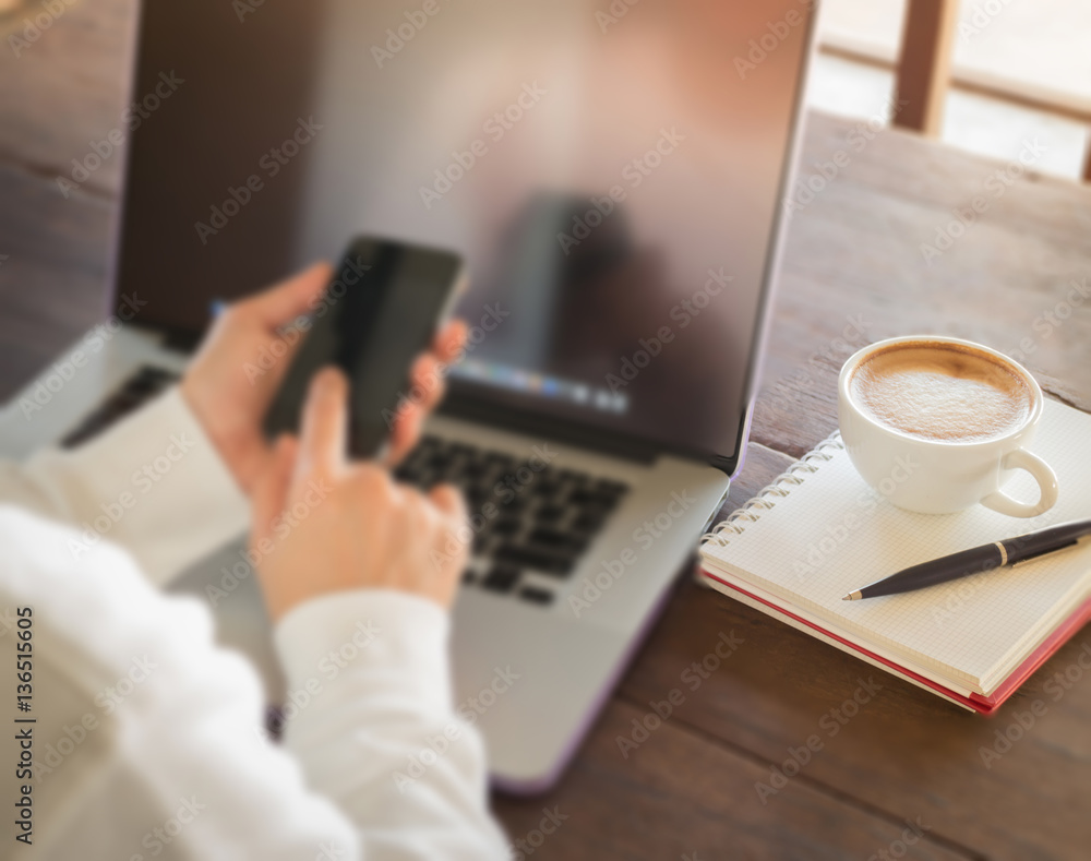 Woman surfing the internet with wireless gadget Woman surfing the internet with wireless gadget