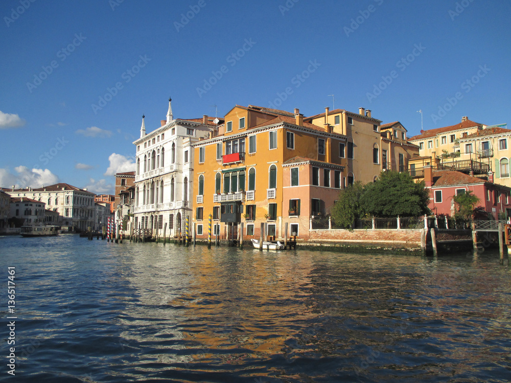 Cruising on the Grand Canal of Venice along Vibrant Color Traditional Buildings, Italy