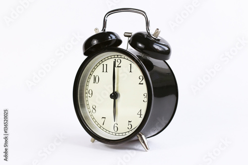 classic table clock on a white background. decor element