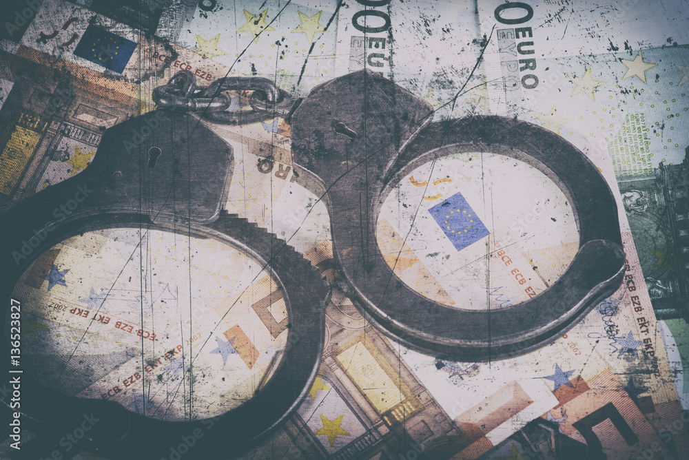 Fototapeta premium Handcuffs and euro bills