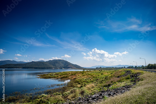 Lake with mountain and blue sky background