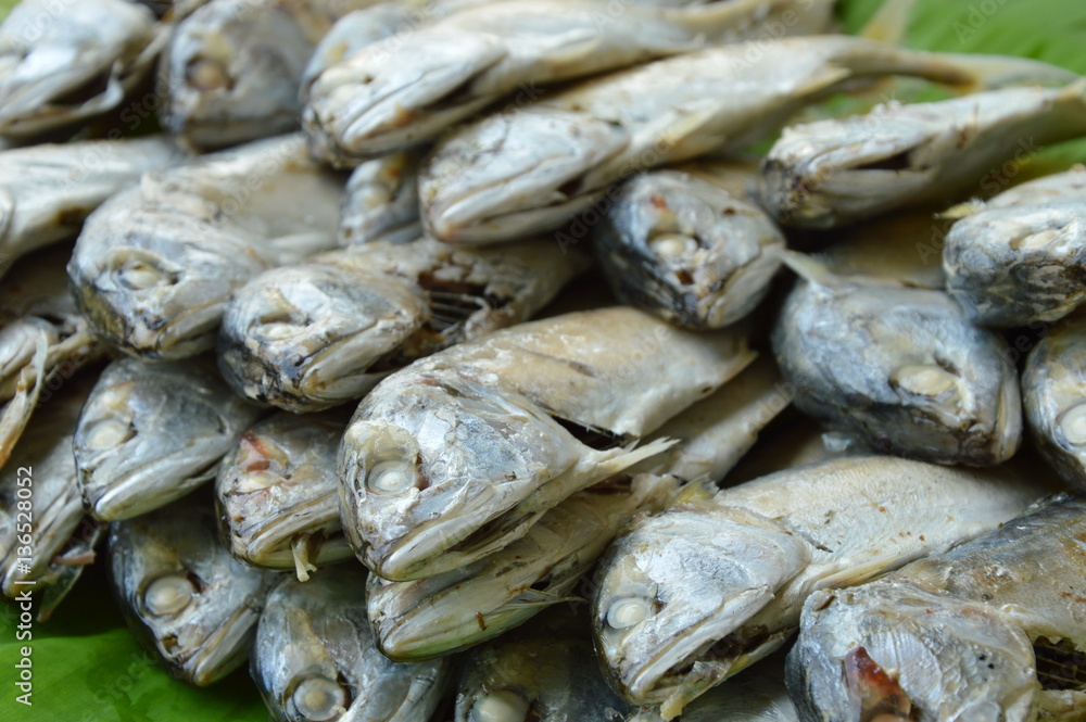 boiled mackerel on fresh banana leaf on market boiled mackerel on fresh banana leaf on market