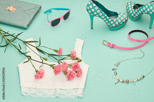 Fashion Design Spring girl clothes set,accessories. Trendy sunglasses, lace top, fashion handbag clutch, flowers.Glamor shoes heels.Summer lady.Creative urban.Pastel spring colors.Perspective view