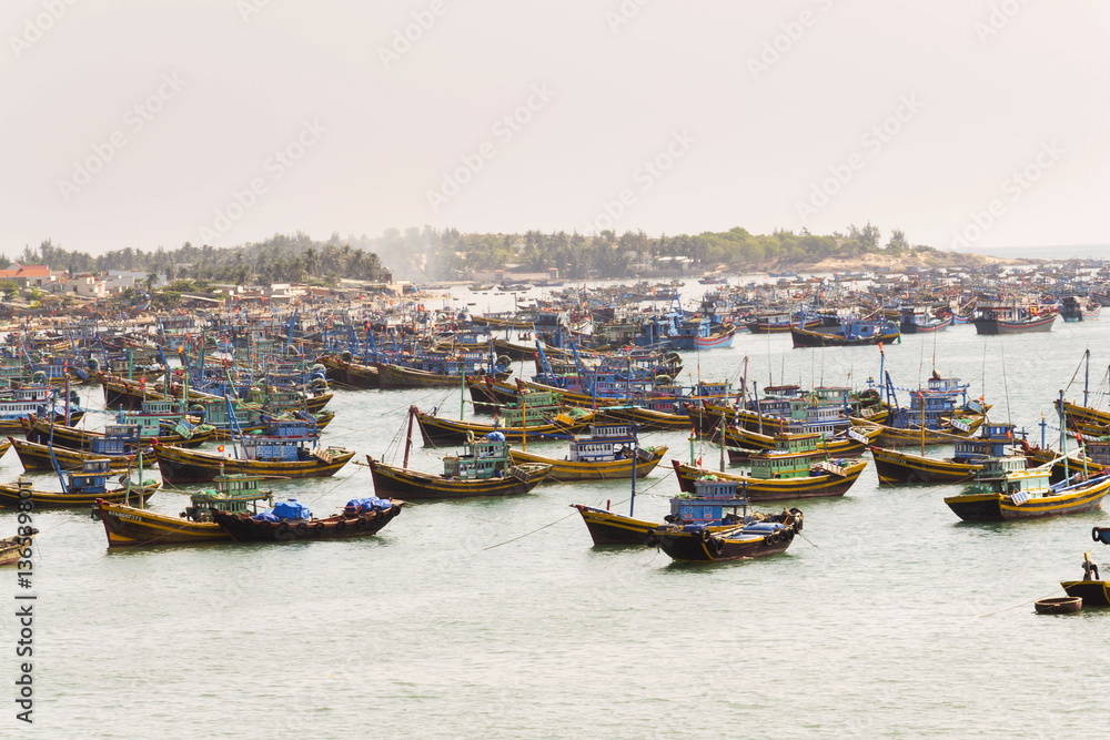Colorful fishing boats in popular tourist destination Mui Ne, Vietnam