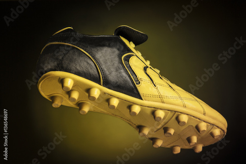 Obraz na płótnie Black - yellow soccer shoe