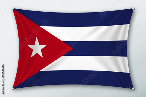 Cuba national flag. Symbol of the country on a stretched fabric with waves attached with pins. Realistic vector illustration.