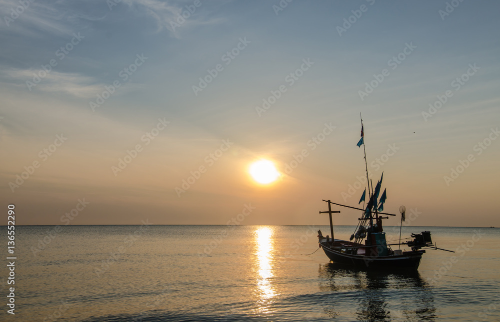 Fishing boats in the morning at sunrise.