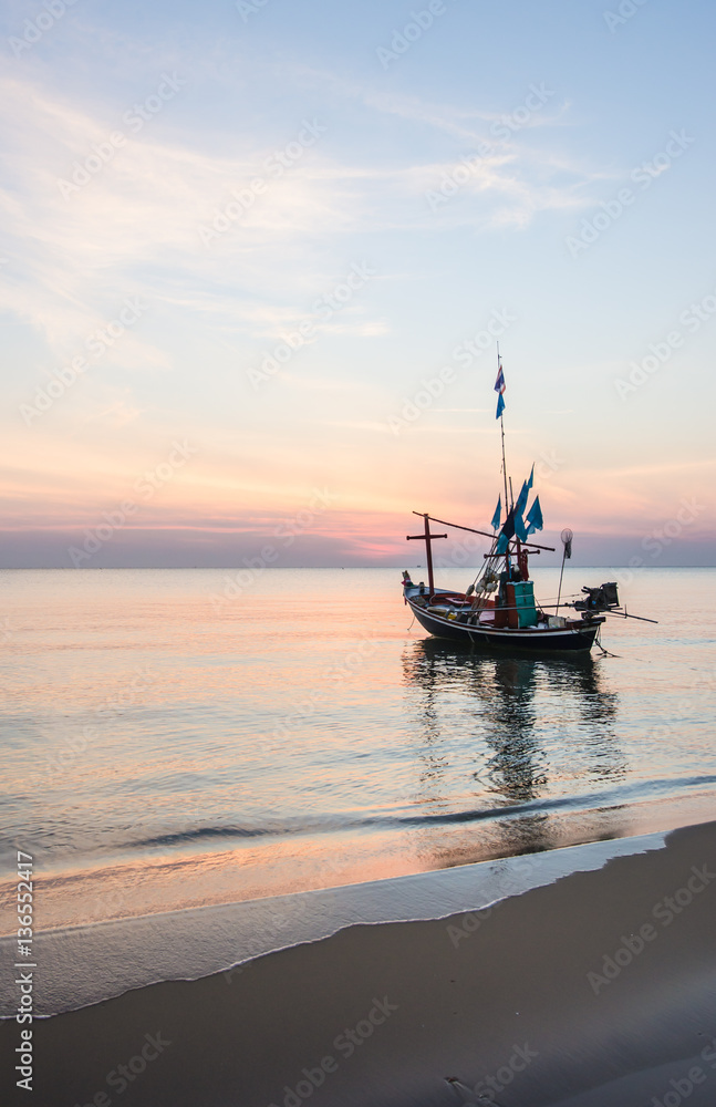 Fishing boats in the morning at sunrise.