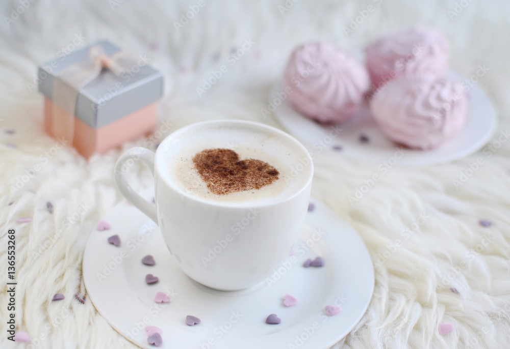 Cappuccino with heart pattern of cinnamon Cappuccino with heart pattern of cinnamon