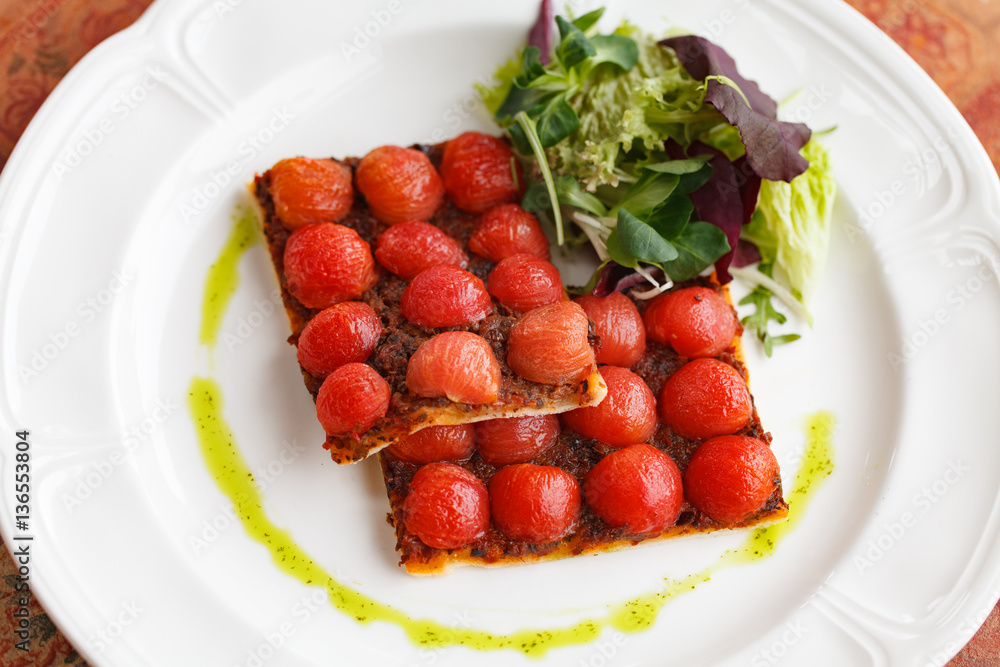 vegetarian tomato pizza on white plate with salad vegetarian tomato pizza on white plate with salad