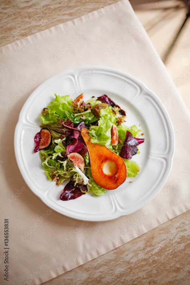 fresh salad with pear and green figs